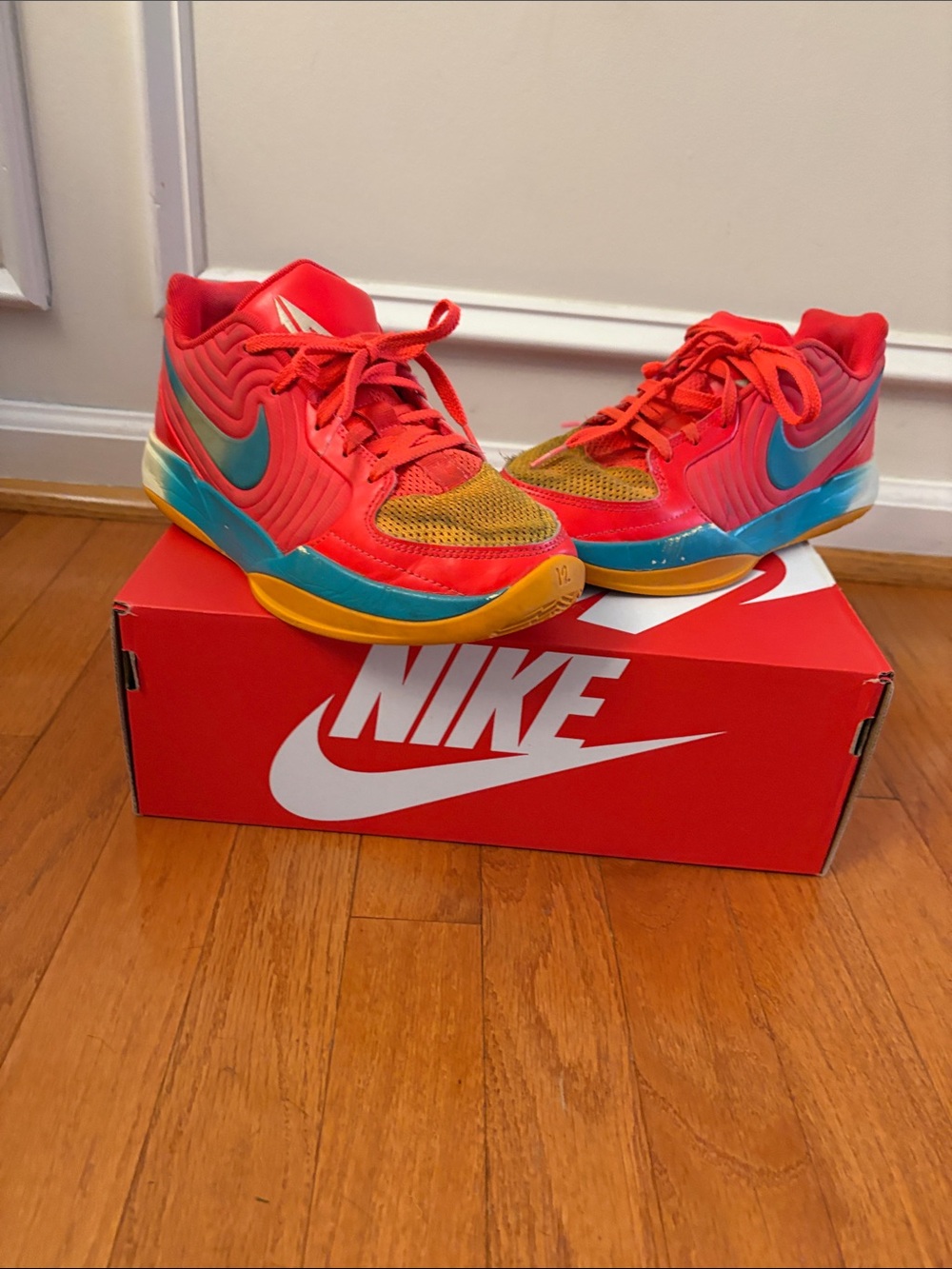 Nike Kids JA Morant Low-Top Sneakers in Bright Red with Teal and Yellow Accents